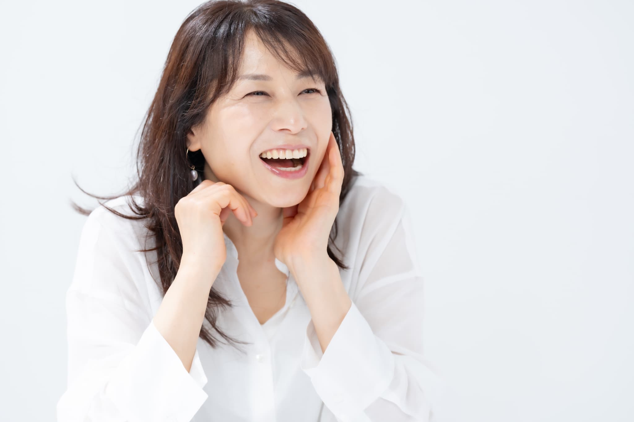 顎関節症を治療して口を開けて笑えるようになった女性